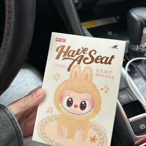 Labubu 'Have A Seat' Doll